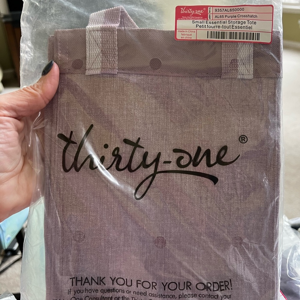 Thirty one bag. New. 10.25 tall x 7.5 L x 5” D